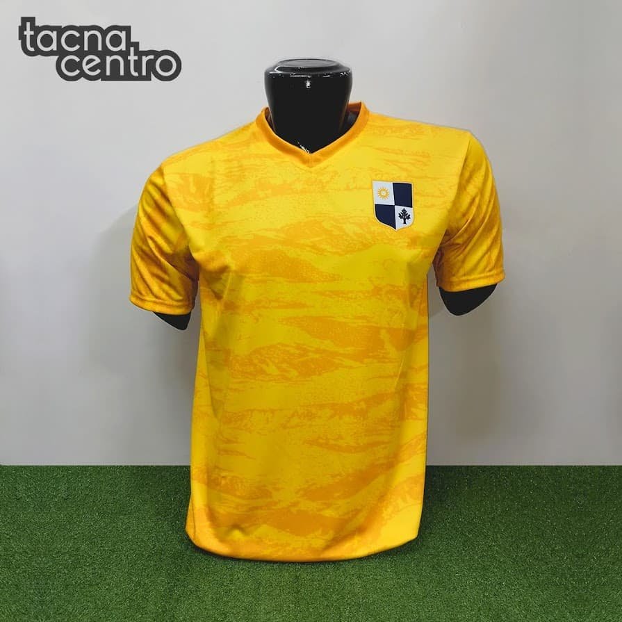 camisetas de futbol amarillo con detalles dorados
