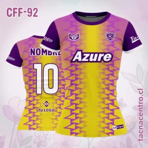 Camiseta de futbol femenino amarillo con triángulos rosados