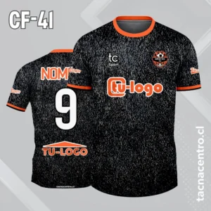 Camiseta de futbol negra con puntos grises mangas naranjas