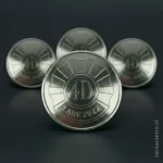 foto de pines plateados forma circular con acabado pulido